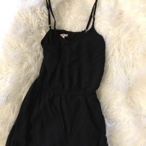Black romper with dots at bottom